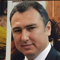 Dr. Özcan  Kuzulu