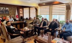 MHP Merkez İlçe yönetimi İl Müftüsü Topçu ile bir araya geldi
